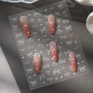 5D embossed nail stickers set with pink gradient press-on nails and white lace bows
