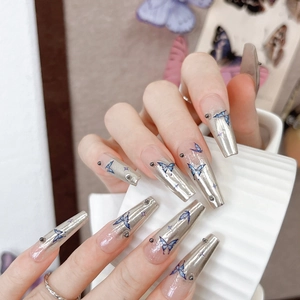 Long coffin y2k silver mirror nails with blue butterfly and black 3D bead decorations