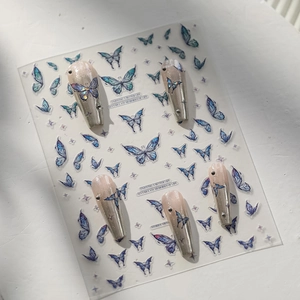 Detailed blue butterfly embossed nail stickers with stars and 3D floral accents