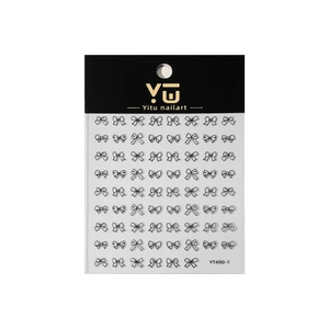 Autocollants nail art nœuds mignons avec motifs de lignes noires sur feuille adhésive