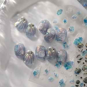 Ocean theme press-on nails with 3D shell texture, aurora pearl finish and nail decals