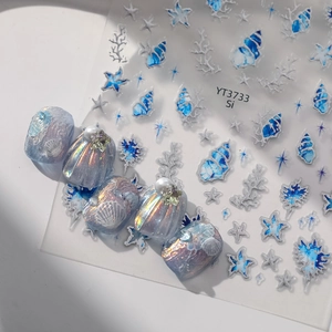 Detailed 5D relief nail stickers featuring ocean seashells, coral, and blue starfish designs