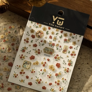 Detail shot of vintage 3D embossed rose nail stickers with retro floral designs