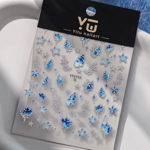 Macro detail of YT3733 ocean nail stickers featuring blue shells and coral designs