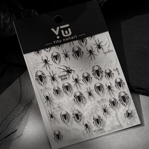 Halloween black and white spider web nail art stickers with various spider motifs