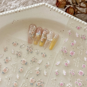 Detailed view of 5D embossed rose garden nail art stickers with vintage floral patterns