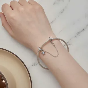 S925 sterling silver mesh bracelet with starfish pendant and safety chain on wrist