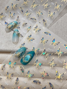 Close-up of blue butterfly nail art stickers with gold foil outlines and 638P label