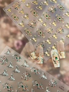 Detailed view of Chinese style nail stickers with gold stamping and pearl patterns