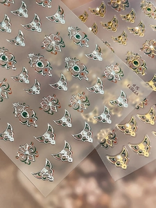 Detail of baroque nail stickers with gold silver patterns and pearl accents YT7073