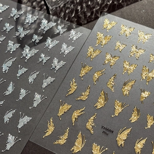 3D embossed silver and gold butterfly nail art stickers with elegant retro motifs