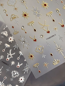 Detailed 3D embossed sun and moon bohemian nail stickers with gold and silver metallic finish
