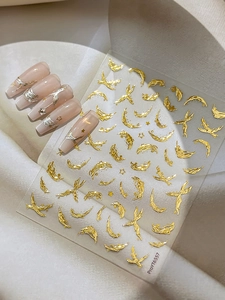 Macro de stickers pour ongles gaufrés lune et étoiles dorées aux motifs célestes