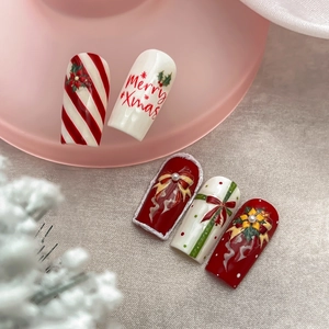 Adesivi per unghie natalizi 3D con fiocco rosso, perle e scritta Merry Xmas a rilievo