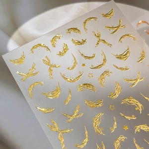 Stickers à ongles 3D en relief dorés avec motifs d'étoiles et de lunes chic