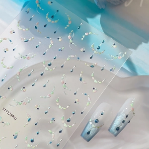 Silver laser shell French nail art stickers with blue gems and glitter sparkles