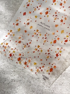 Macro view of YT7069 autumn maple leaf nail art stickers with translucent fall patterns