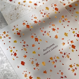 Autumn maple leaf nail stickers with matte finish and 3D texture on stone background