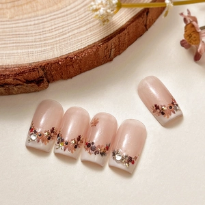 Elegant nude pink fall nail stickers with floral patterns and sparkling crystal rhinestones