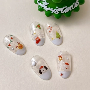 Jelly Christmas press-on nails featuring cute 3D reindeer, Santa, and tree designs
