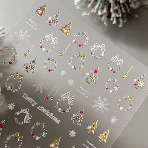 3D Christmas nail stickers with pearl relief, golden snowflakes, and festive wreaths decor