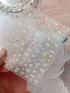 Detail of YT7125Te nail art sticker with 3D pearl bows and metallic heart star designs