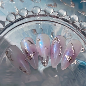 Almond-shaped holographic purple aurora nail stickers with silver 3D liquid metal accents