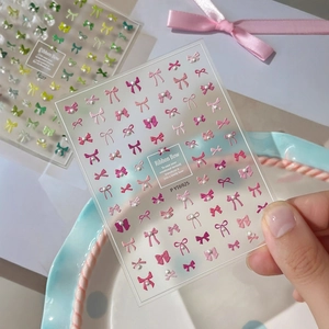 3D Schleifen Nagelsticker mit Perlen in Rosa und Rot für eine elegante Maniküre Kunst