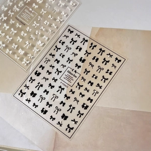 Elegante 3D-Schleifen-Nagelaufkleber mit Perlen für eine französische Maniküre-Optik