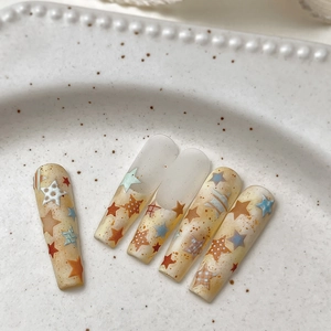 Künstlerische Stern-Nagelsticker im Coffin-Stil mit orangefarbenem gesprenkeltem Design