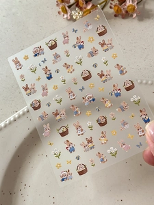 Detail of embossed rabbit nail stickers with 3D texture on transparent backing