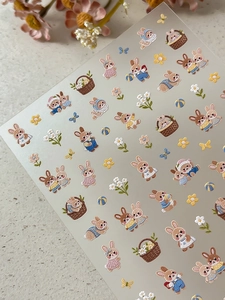 Detail of embossed rabbit nail stickers with 3D texture and cute floral patterns