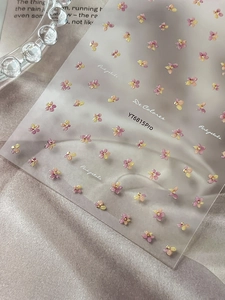 Detail of YT6815Pro floral nail stickers with pink petals and gold accents
