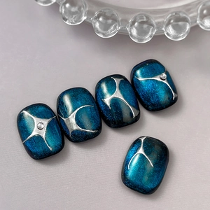 Starry blue cat-eye nail art stickers with silver lines and rhinestones, 5pcs set