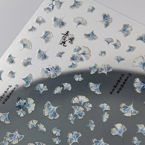 Ginkgo leaf nail stickers with gold foil, blue gradient design and Chinese calligraphy