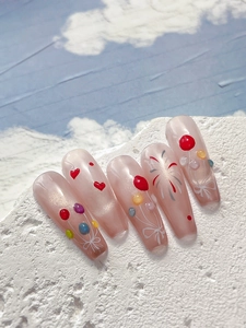 Macro shot of long coffin nails with 3D colorful balloons and firework hand-painted art