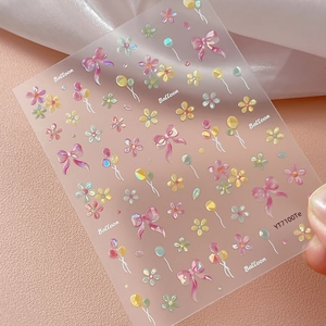 Adesivi olografici per unghie con fiori e palloncini e fiocchi rosa per manicure
