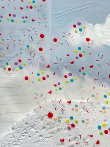 Macro view of 3D embossed colorful balloon and firework pattern nail art stickers