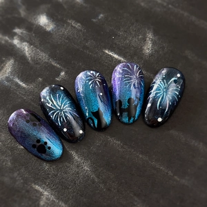 Deep blue cat-eye nail art stickers with fireworks and cute cat silhouettes