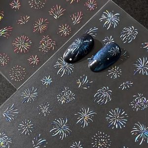 Fireworks nail art stickers with colorful patterns and dark blue pearlescent sample nails