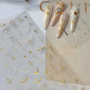 Adesivi per unghie metallici oro e argento con motivi celesti di luna e sole