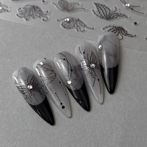 Exquisite butterfly nail stickers with rhinestones on black and gray gradient stiletto nails