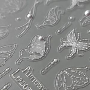 3D embossed butterfly nail stickers with white pearls and luxury flutterby design