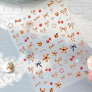 Autocollants à ongles avec motifs de nœuds et cerises en imprimé léopard pour manucure