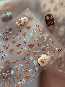 3D embossed Christmas nail art stickers featuring gingerbread man and tree patterns