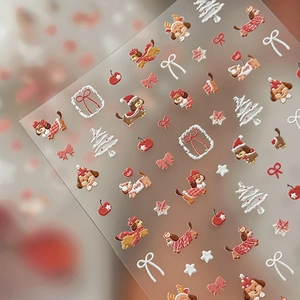 3D embossed Christmas dog nail art stickers with festive trees, snowflakes and bows