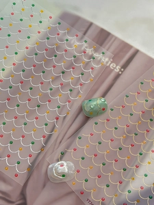 Detailed Christmas nail stickers with gold silver waves and colorful star accents