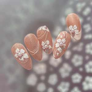 5pcs 3D floral press-on nails with white relief flowers and pearls on soft orange pink base
