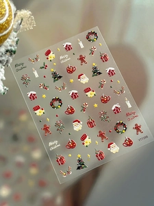 5D embossed Christmas nail art stickers featuring Santa Claus and gingerbread man YT7398