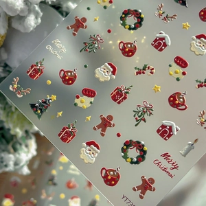 5D embossed Christmas nail art stickers with Santa Claus and gingerbread man patterns